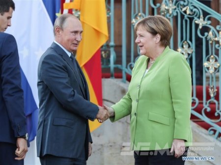 В.Путин, А.Меркель нар хэлэлцээ хийжээ
